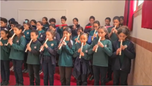 Nefertarians performing Christmas Carols using the recorder and melodica