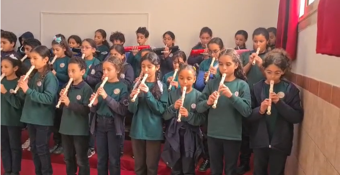 Nefertarians performing Christmas Carols using the recorder and melodica